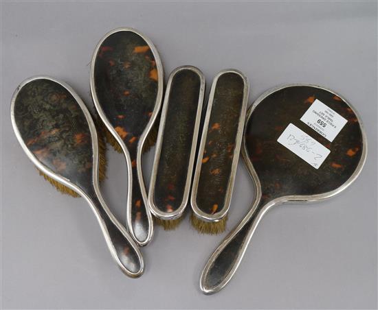 A George V silver and tortoiseshell mounted five piece dressing table set, Mappin & Webb, London, 1925.